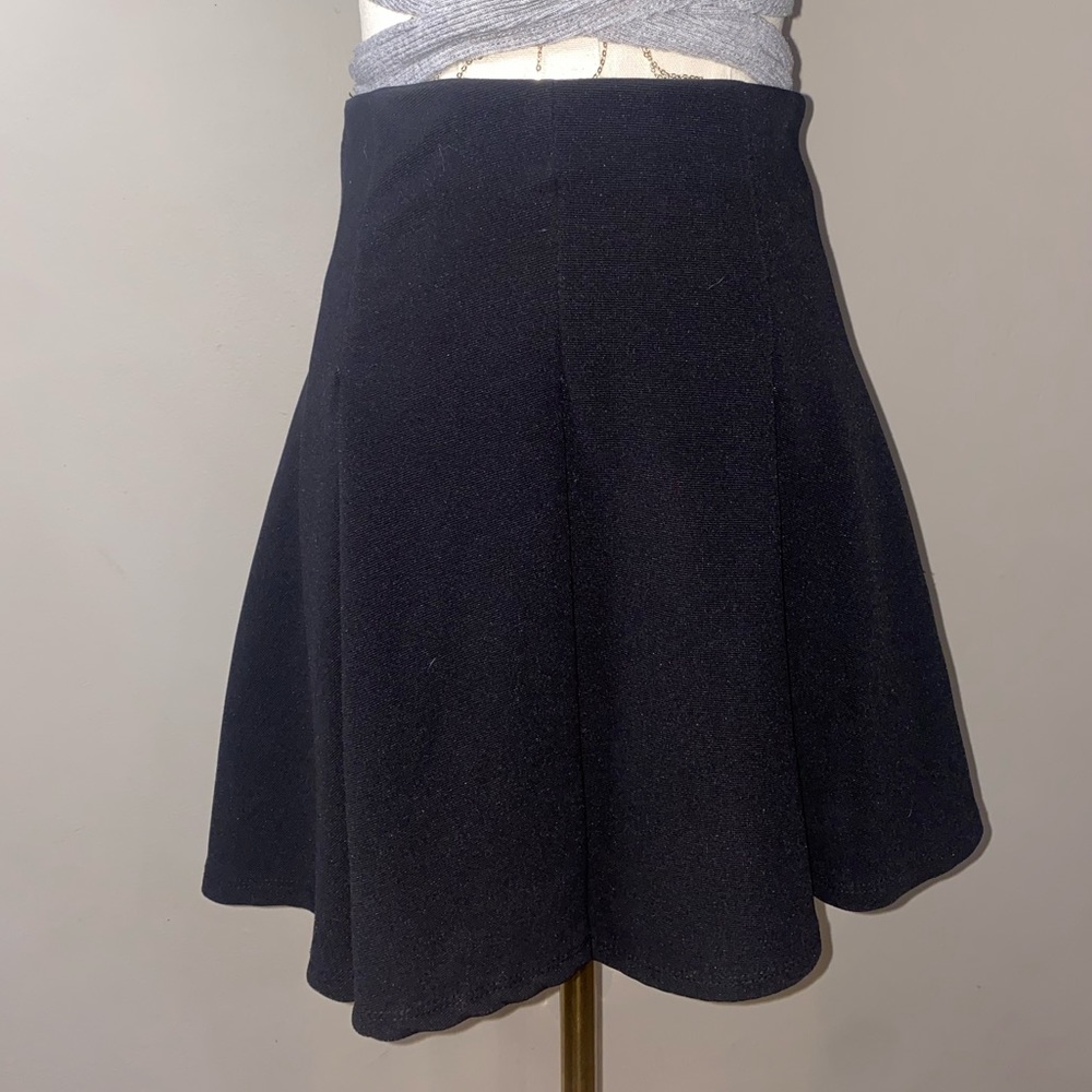 Women’s black pleated skirt
